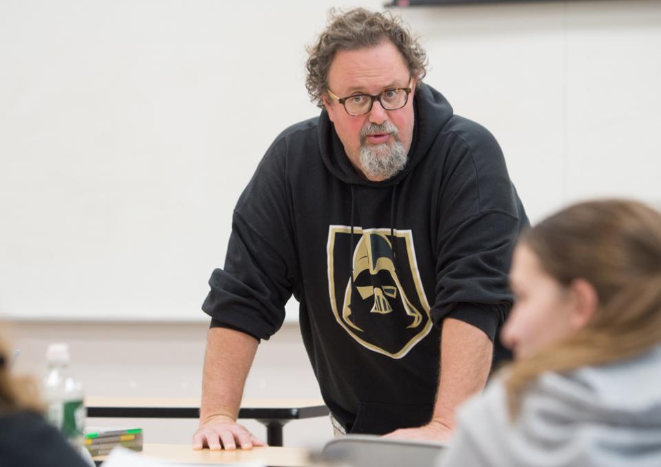 Roy Bakos teaching in the classroom