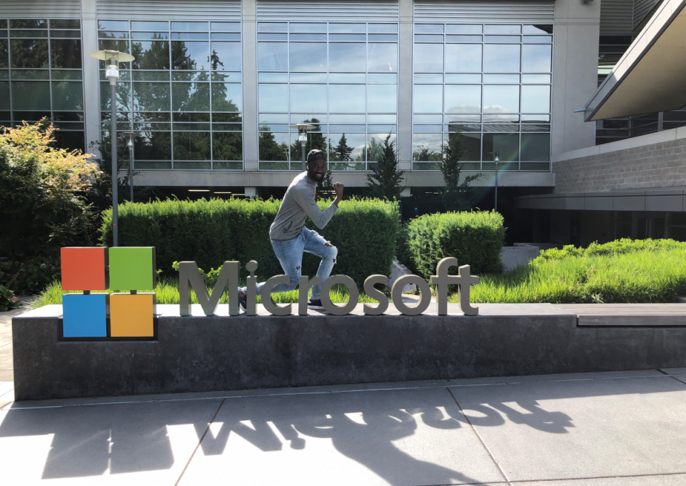 Koanda standing on Microsoft logo