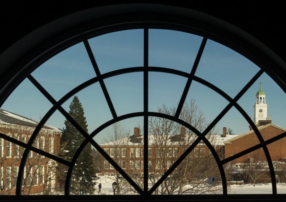 Winter scene of Rockwell Hall through a window