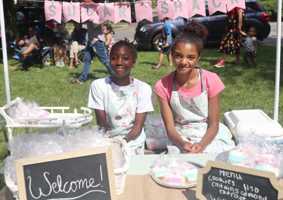 kids selling homemade goods at "KidBiz Market" event