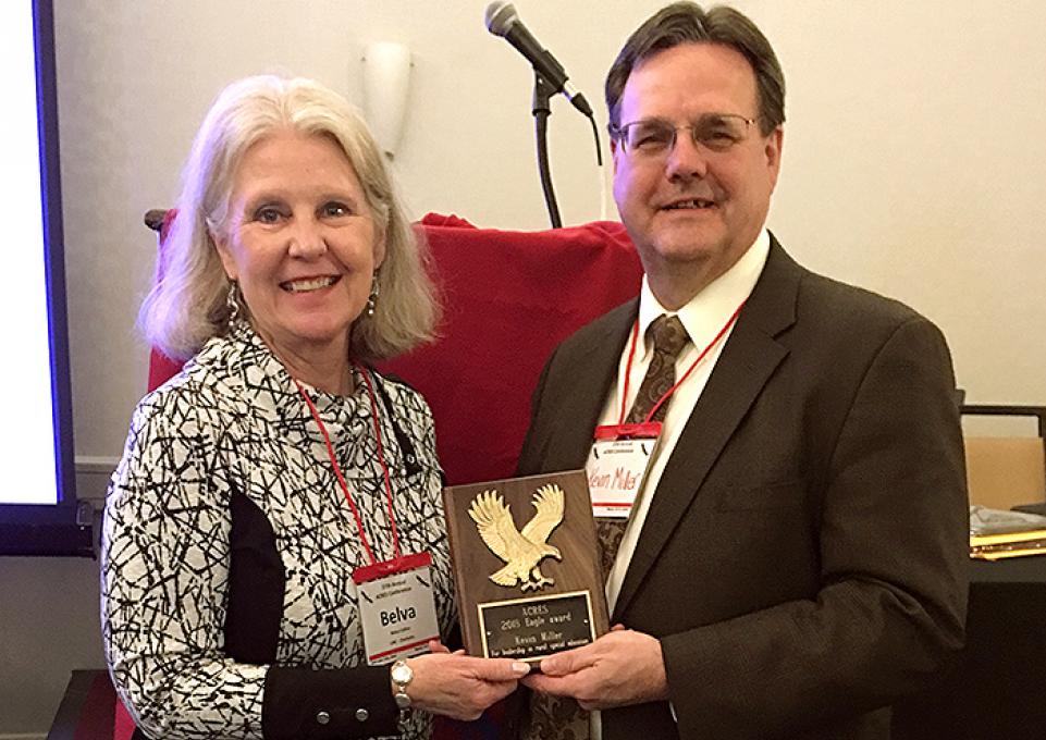 Graduate school dean "Kevin Miller" receives Acres Eagle award