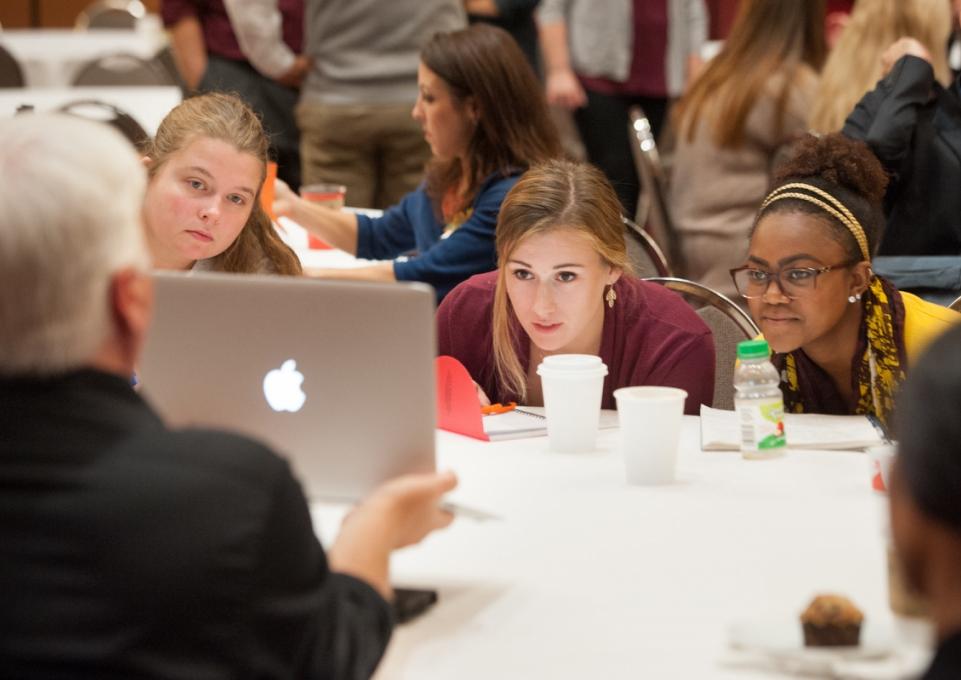 students staring at screen