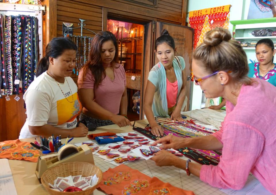 women stitching