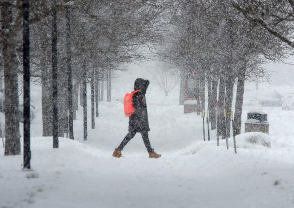 student in the snow